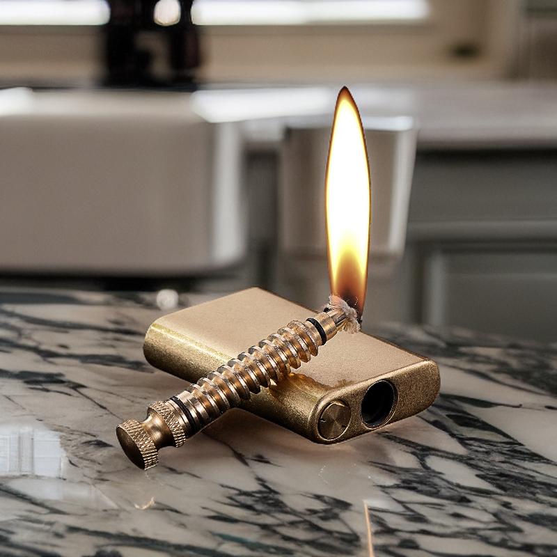 Vintage-style gold infinity match lighter with a long adjustable wick, providing a classic touch to its design.