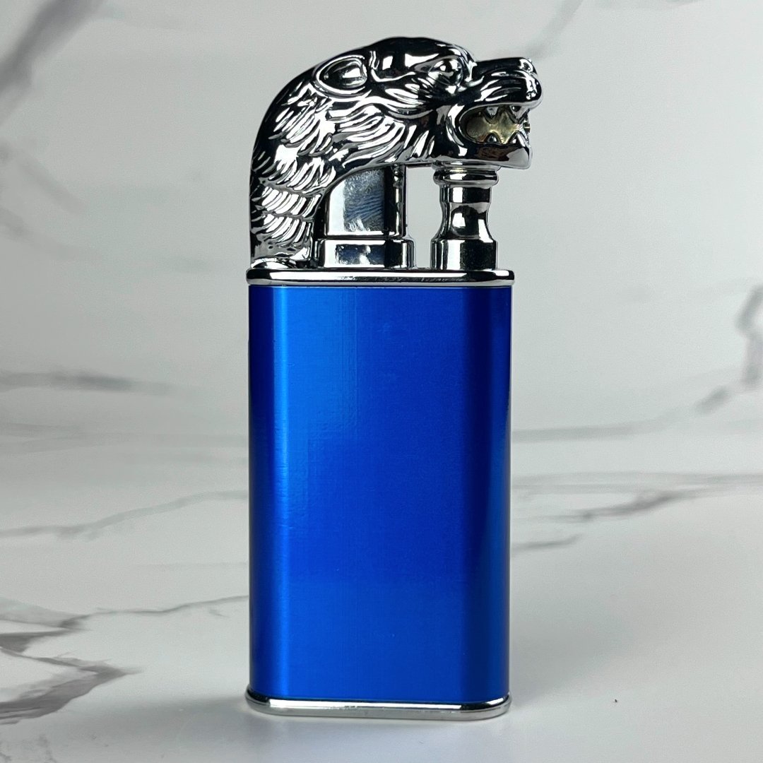 Metallic blue torch lighter featuring a silver lion-dragon hybrid design.