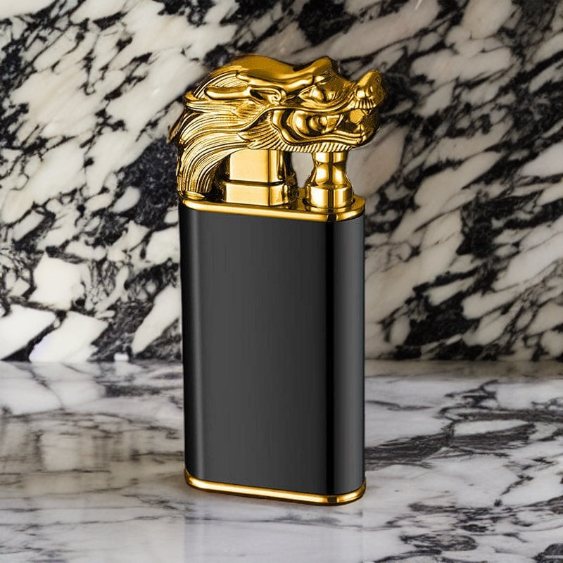 Luxurious dragon-themed lighter with a gold dragon head and black body, displayed on a marble background.