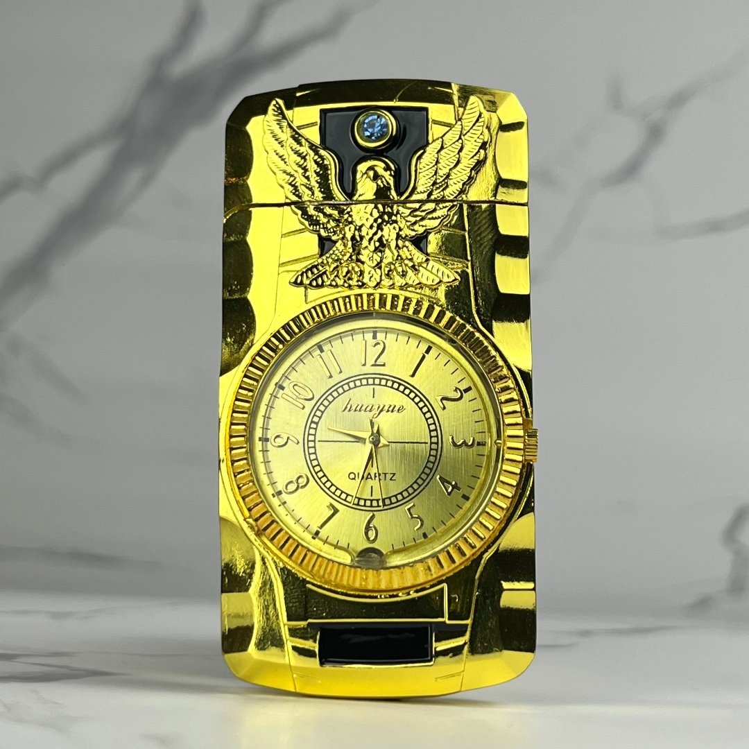 Gold torch lighter with built-in watch face and engraved eagle emblem.