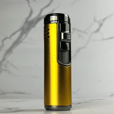 Sleek gold refillable torch lighter with black ignition switch and textured grip, standing on marble background.