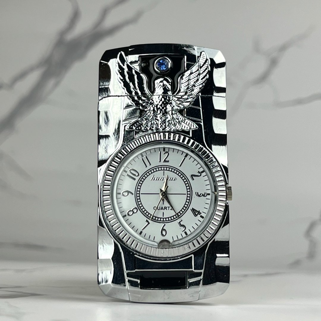 Chrome silver lighter with quartz watch and raised eagle design.