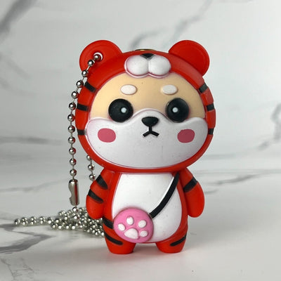 Tiger Flame Lighter – red refillable butane lighter shaped like a cartoon tiger with keychain necklace and soft open flame ignition