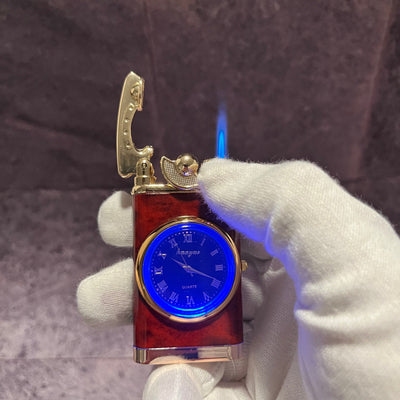 Time Torch Lighter – refillable mahogany and gold butane lighter with functional LED clock face, producing a blue torch flame while held in a white glove