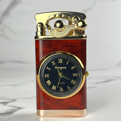 Wood grain refillable lighter with gold trim and quartz clock face, featuring a vintage ignition lever, photographed on a marble surface.